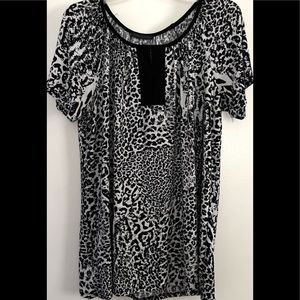 Black & white animal print, Super soft, excellent condition banded neckline.